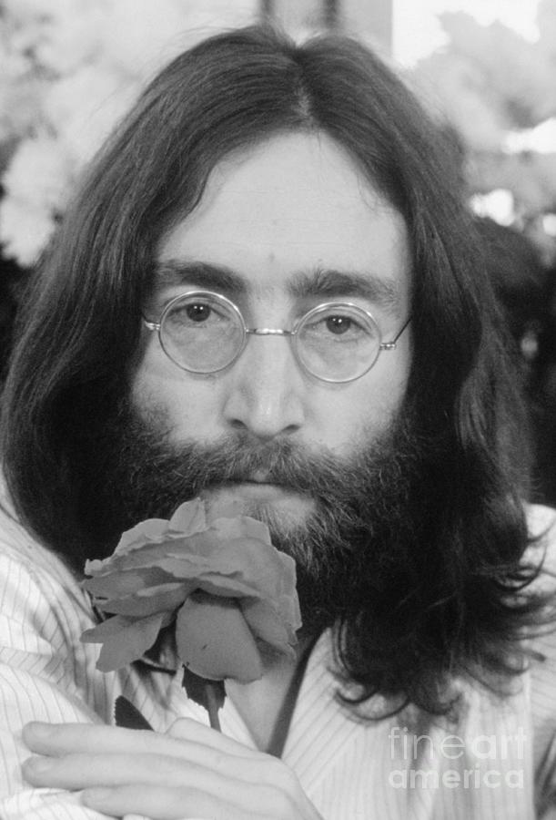 Head Shot Of John Lennon With Rose Photograph by Bettmann