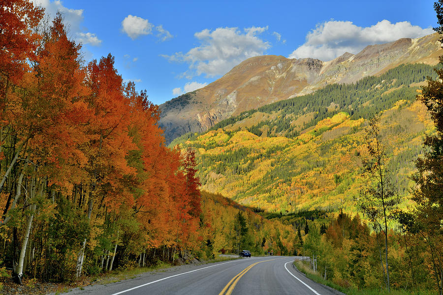 Heading North on Fall Colored Million Dollar Highway Photograph by Ray Mathis