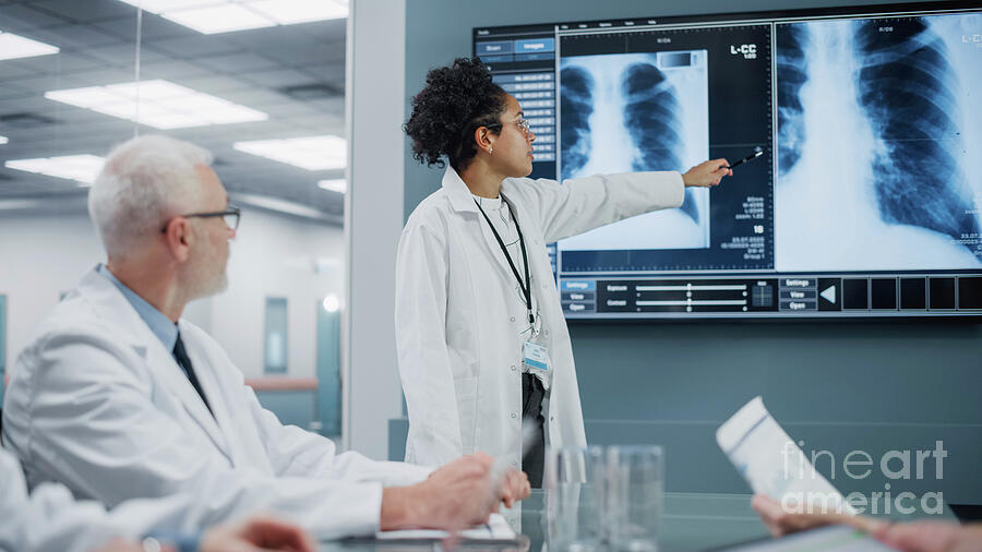 Healthcare Professionals Discussing X-ray Photograph by Gorodenkoff Productions/science Photo Library Healthcare Professionals Discussing X-ray Photograph by Gorodenkoff Productions/science Photo Library