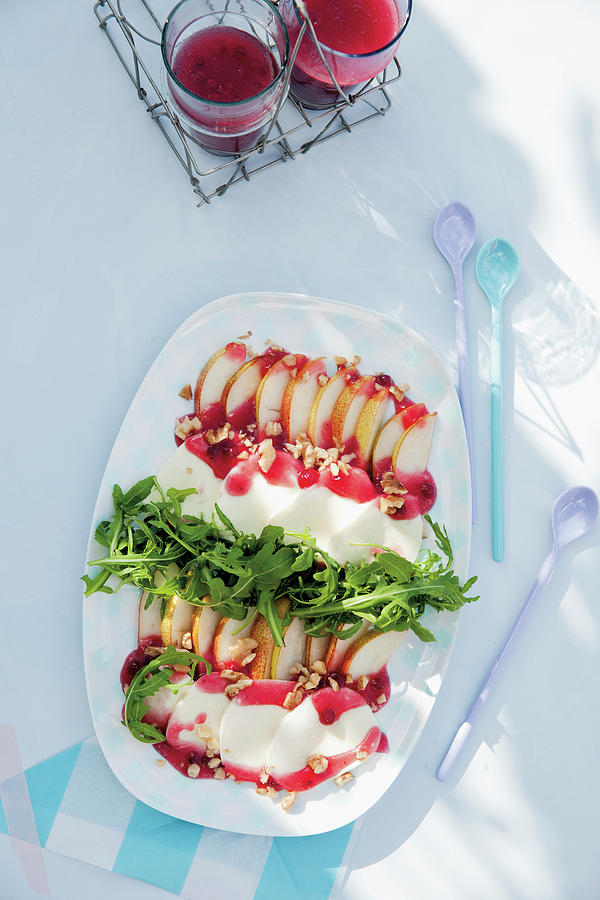 Healthy Carpaccio Made From Pears, Mozzarella And Lingonberries Photograph by Tre Torri