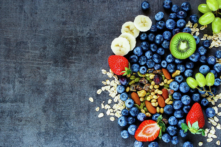 Healthy Ingredients For Muesli And Smoothies seen From Above Photograph by Yuliya Gontar