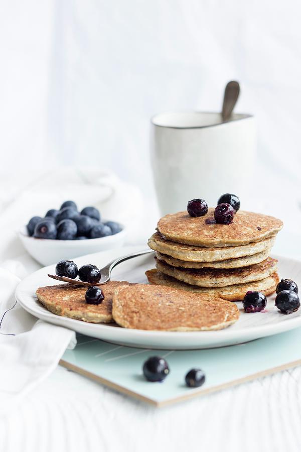 Healthy Pancakes With Bananas, Chia And Blueberries Photograph by Tamara Staab