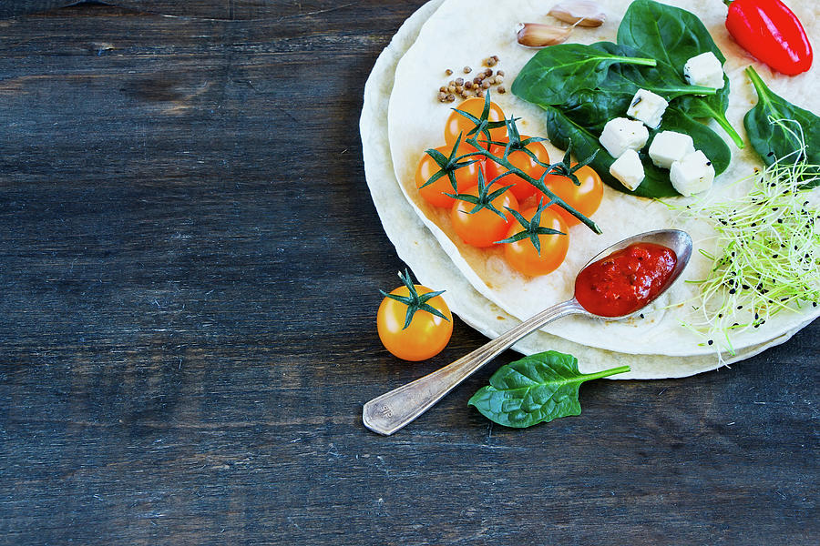 Healthy Tortillas Flat And Various Vegetables For Tacos Or Burrito Making On Rustic Wooden Background Photograph by Yuliya Gontar