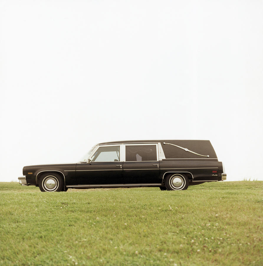 Hearse Parked On Grass, Side View by Walter B. Mckenzie