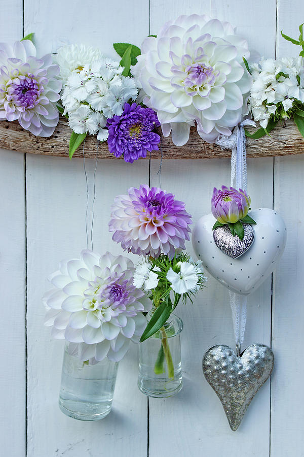 Heart Decorations And Small Suspended Bottles Holding Dahlias, Asters And Sweet Williams Photograph by Angelica Linnhoff