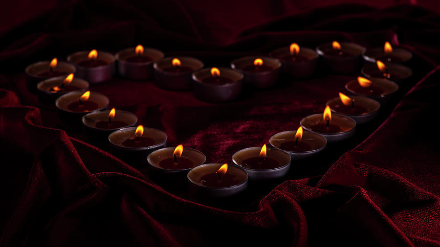 Burning heart of candles Photograph by Ina Osovskaja - Fine Art America