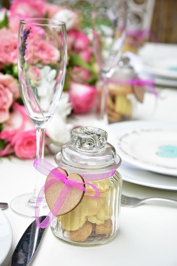 Heart Shaped Biscuits In A Decorative Gift Jar On A Festively Laid Table Photograph by Great Stock!