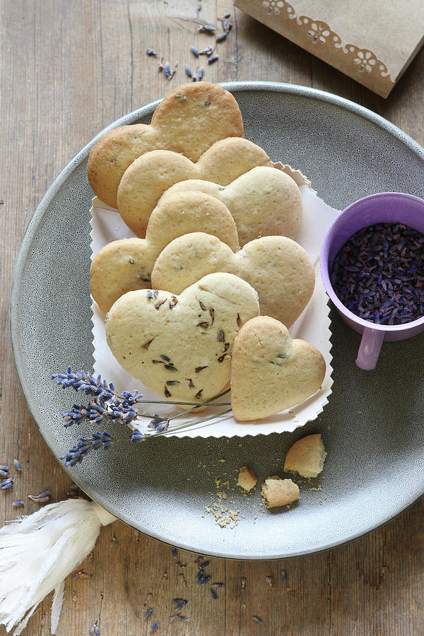 Heart-shaped, Gluten-free Lavender Shortbread Biscuits In A Cardboard Dish Photograph by Regina Hippel