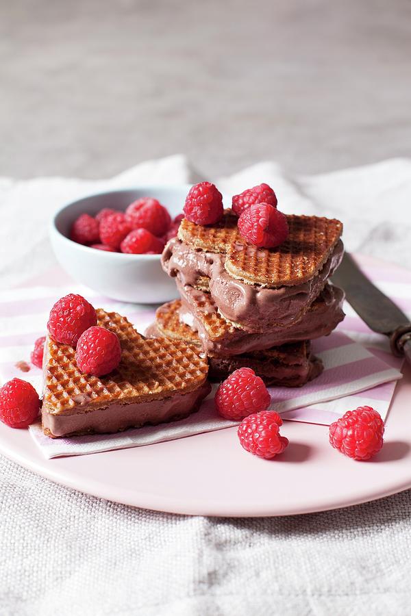 Heart-shaped Ice Cream Sandwiches With Stroopwaffels, Chocolate Ice Cream And Raspberries Photograph by Great Stock!
