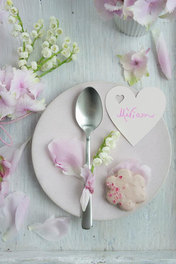 Heart-shaped Name Tag, Rose-petal Biscuits And Spoon Decorated With Lily-of-the-valley On Plate Photograph by Martina Schindler