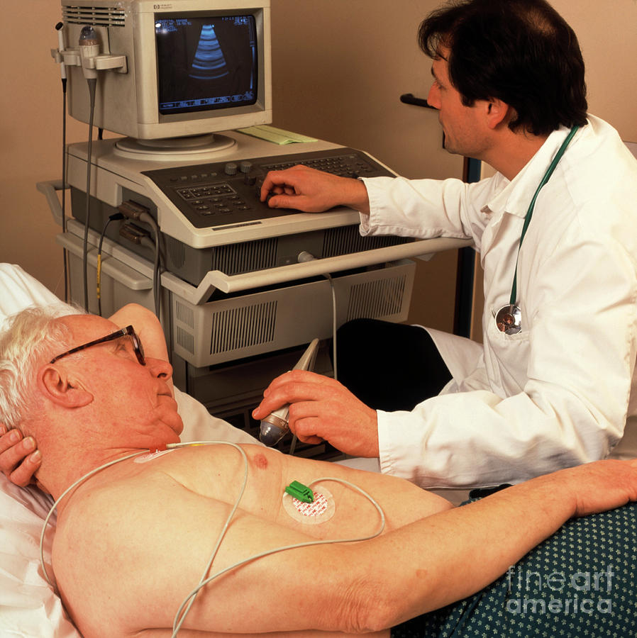 Heart Ultrasound Scan Being Conducted On A Man Photograph by Cc Studio/science Photo Library
