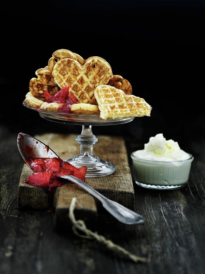 Heart Waffles With Strawberry Jam And Whipped Cream Photograph by Mikkel Adsbl