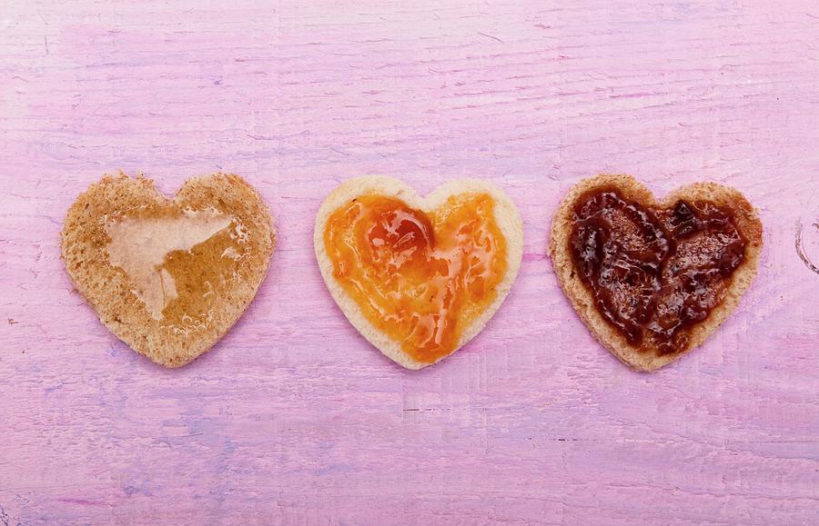 Hearts Cut Out Of Bread, With Jam And Honey, For Valentines Day Photograph by Lutt, Carine