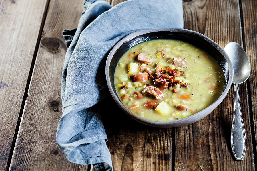 Hearty Pea Soup With Sausages And Bacon Photograph by Susan Brooks-dammann