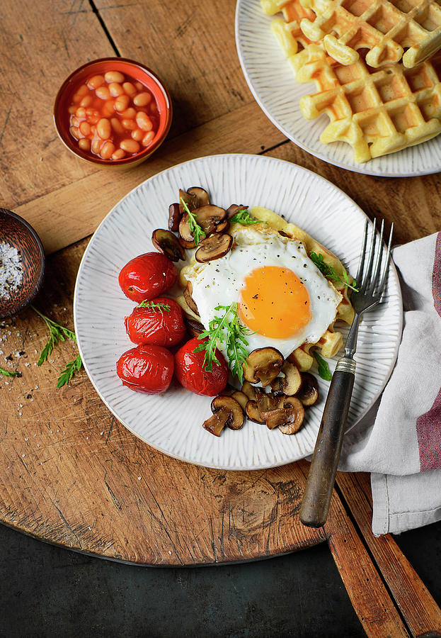 Hearty Waffles With A Fried Egg, Tomatoes, Mushrooms And Baked Beans Photograph by Ewgenija Schall