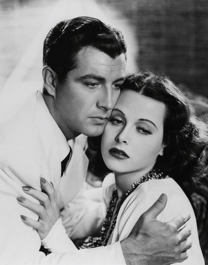 HEDY LAMARR and ROBERT TAYLOR in LADY OF THE TROPICS -1939-. Photograph by Album
