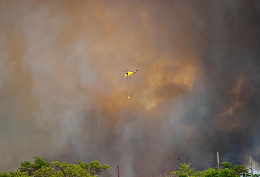 Helicopter Fire Fight Photograph by Anthony Jones