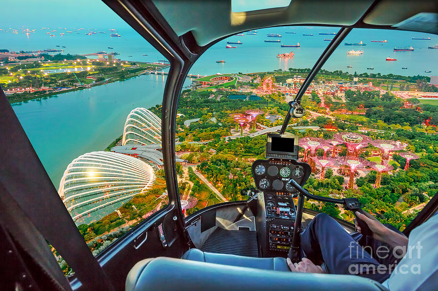 Helicopter on Singapore bay Photograph by Benny Marty