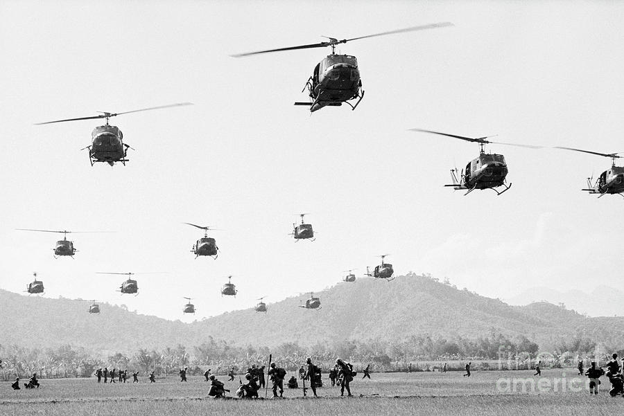 Helicopters Landing In Vietnam Photograph by Bettmann