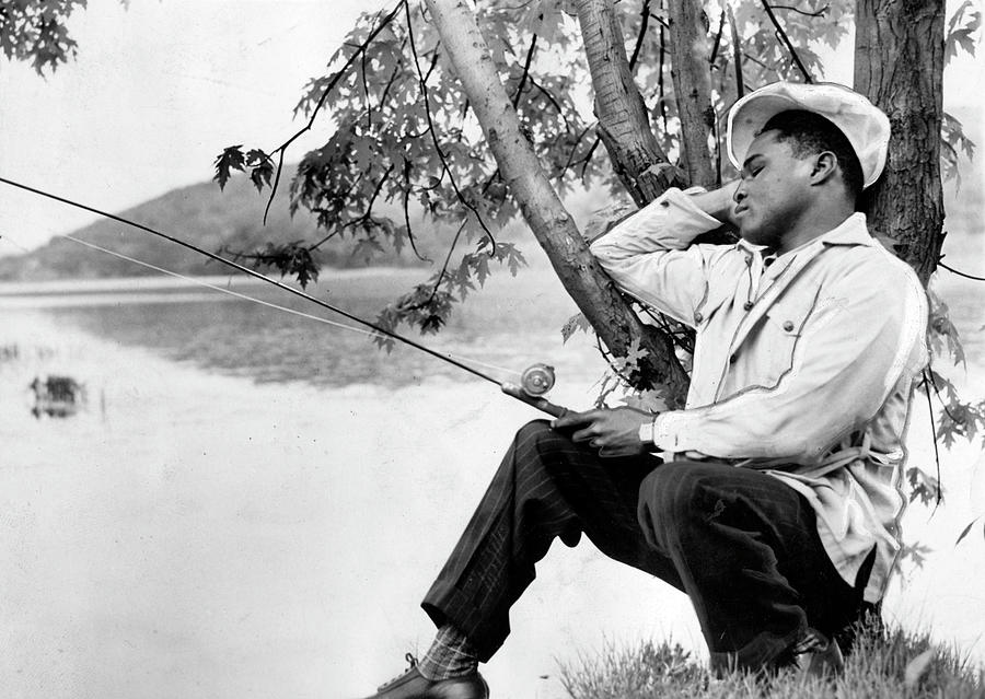 Henry Armstrong Fishing Photograph by Afro Newspaper/gado