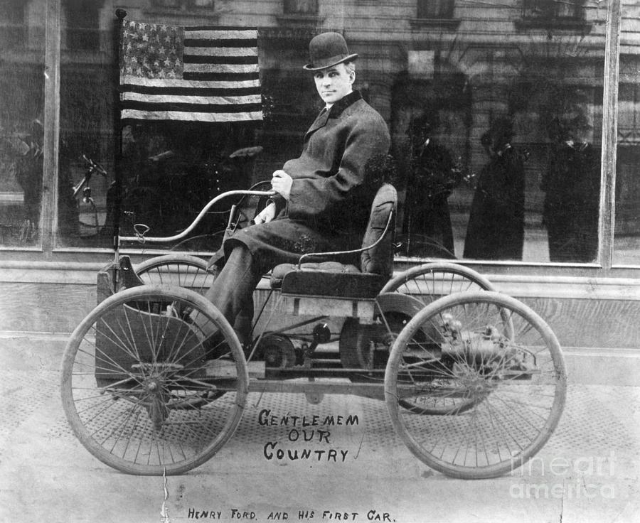 Henry Ford Seated In His First Car Photograph by Bettmann