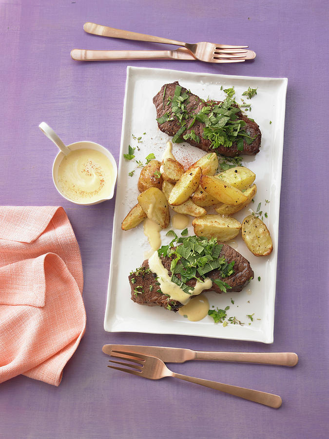 Herb Roasted Beef With Roasted Potatoes And Bearnaise Sauce Photograph by Jan-peter Westermann