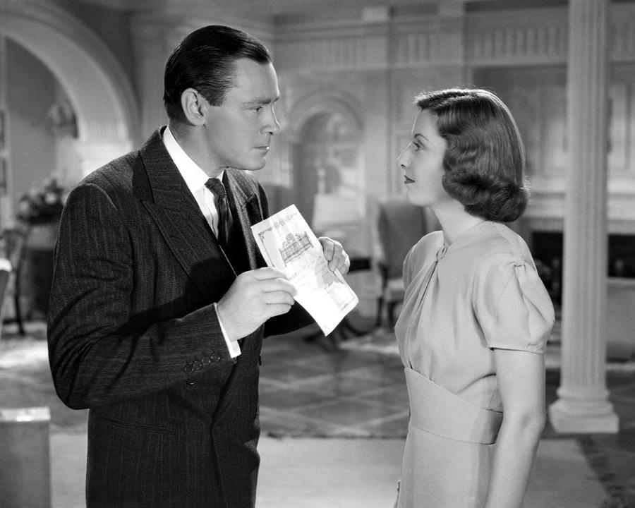 Herbert Marshall Showing Paper To Barbara Stanwyck Photograph by Globe ...