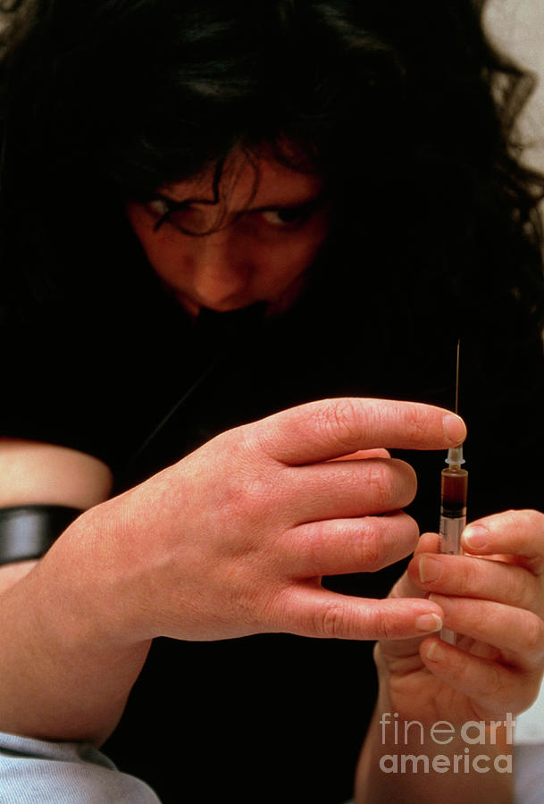 Heroin User Prepares A Syringe For Injection Photograph by Conor Caffrey/science Photo Library
