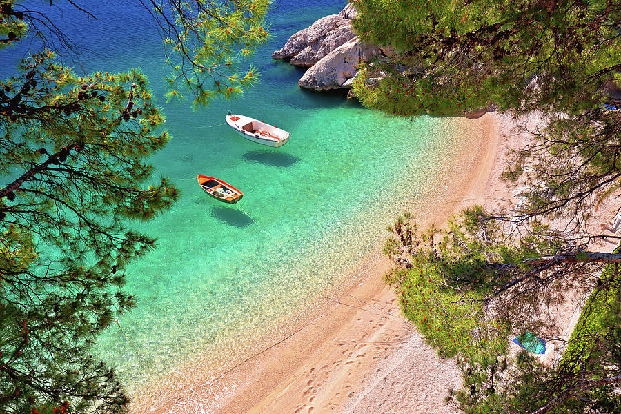 Hiden beach in Brela with boats on emerald sea aerial view Photograph by Brch Photography