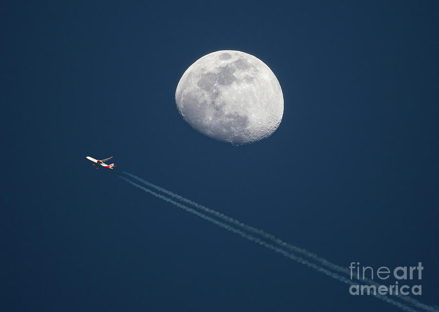 High Altitude Airliner and Gibbous Moon by Kevin McCarthy High Altitude Airliner and Gibbous Moon by Kevin McCarthy