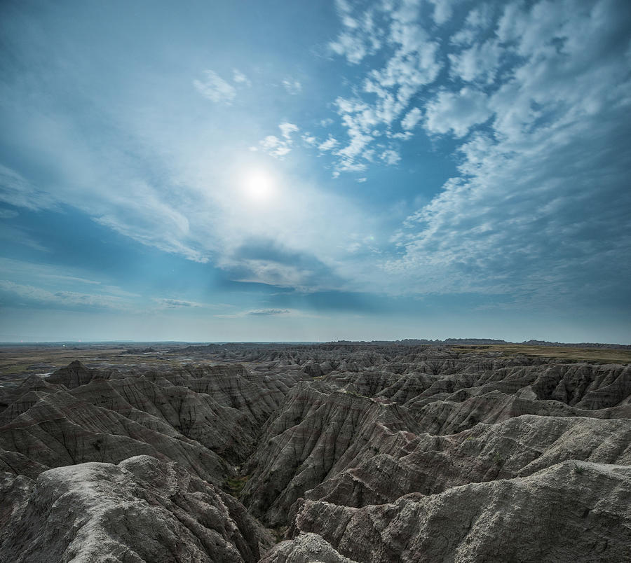 Badlands National Park Photograph - High Angle Idyllic View Of Rock Formations At Badlands National Park Against Cloudy Sky by Cavan Images