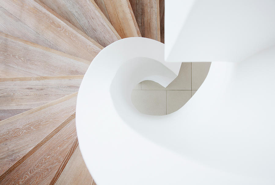 High Angle View Of Curving Staircase Photograph by Martin Barraud