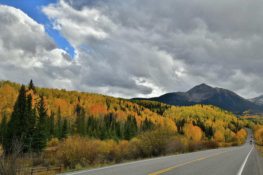 Highway 145 Fall Colors and Sunshine Mountain Photograph by Ray Mathis