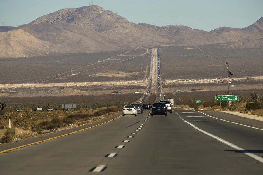 highway road leading into Las Vegas Photograph by Alex Grichenko