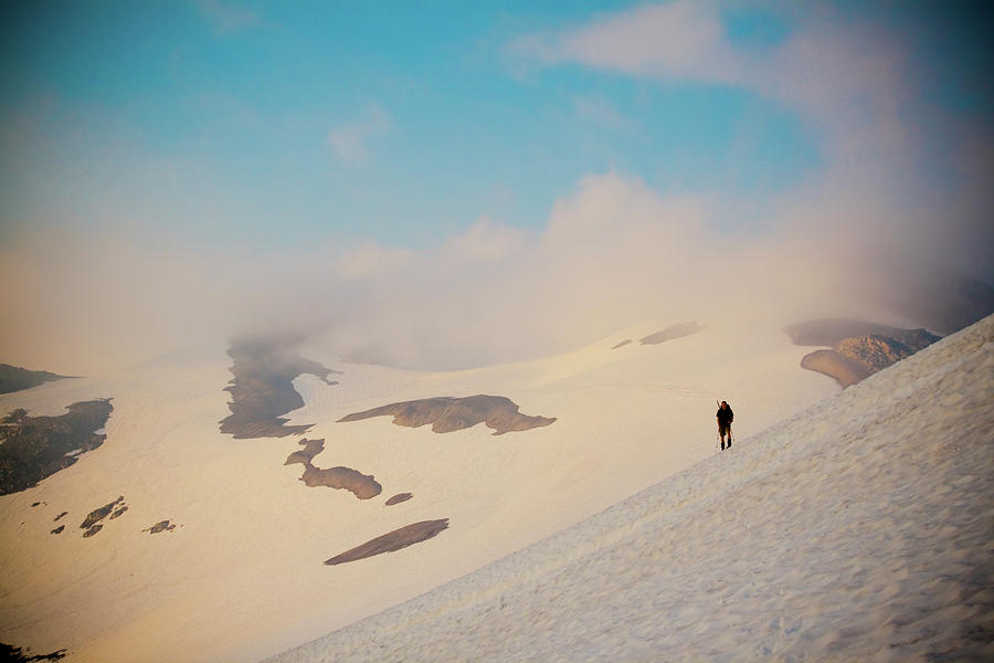 Hiker Crosses Snowfield Photograph by Christopher Kimmel