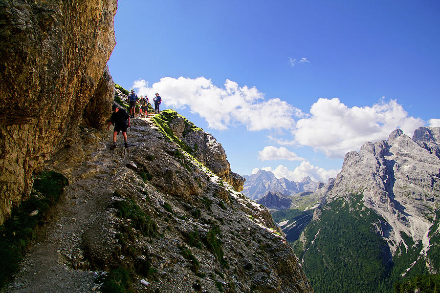 Hikers on steep trail up Monte piana Photograph by Steve Estvanik