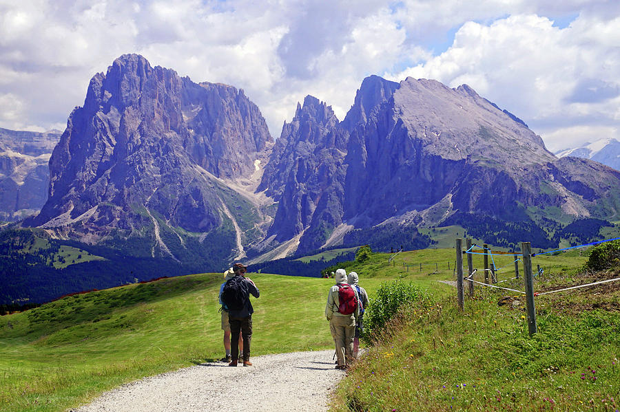 Hikers walking towards the Langkofel  Photograph by Steve Estvanik