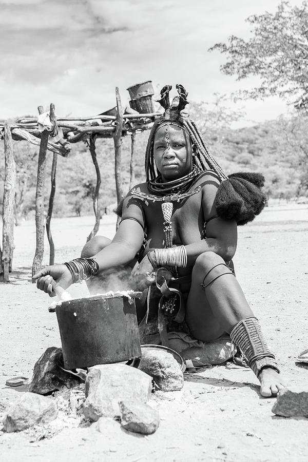 Himba woman cooking Photograph by Mache Del Campo