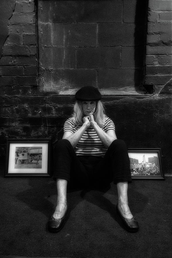 Hippie in beret sitting on the floor Photograph by Dan Friend