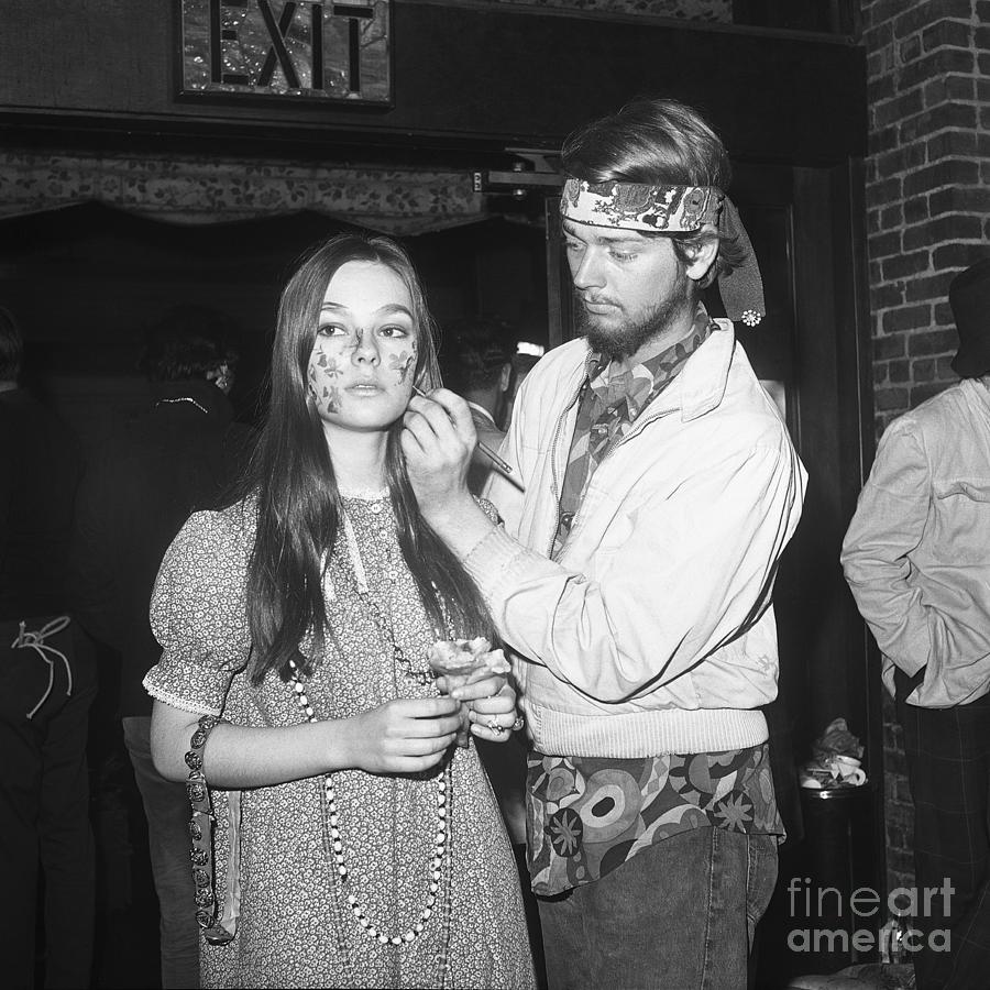 Hippie Woman Getting Her Face Painted Photograph by Bettmann