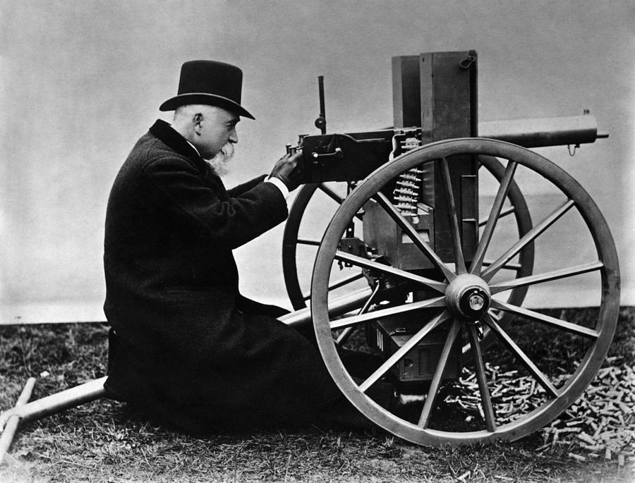 Hiram Maxim firing his Maxim Machine Gun - 1884 Photograph by War Is Hell Store