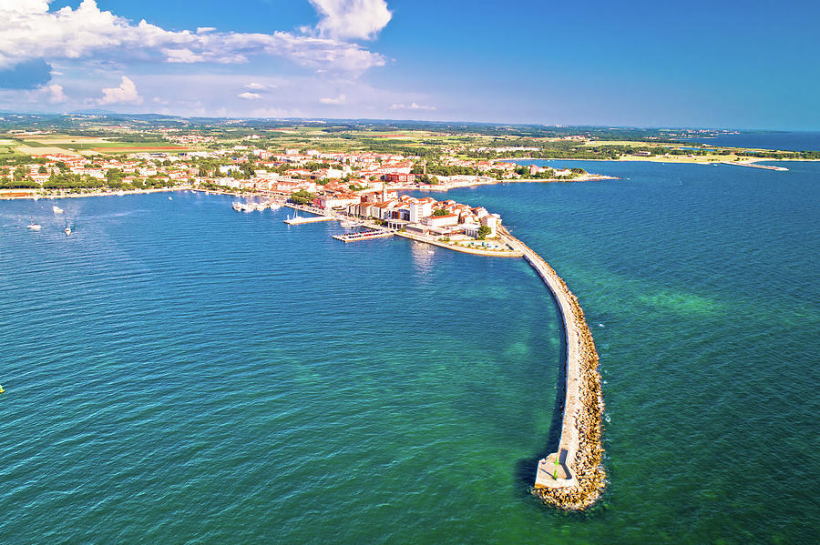 Historic town of Umag and harbor breakwater aerial view Photograph by Brch Photography