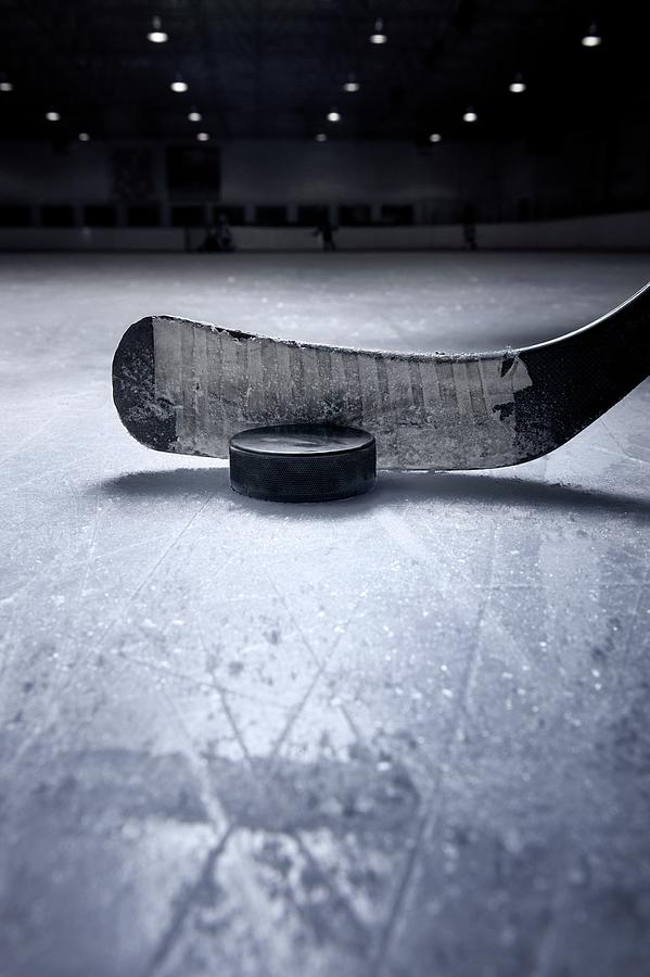 Hockey Stick And Puck Photograph by Francisblack
