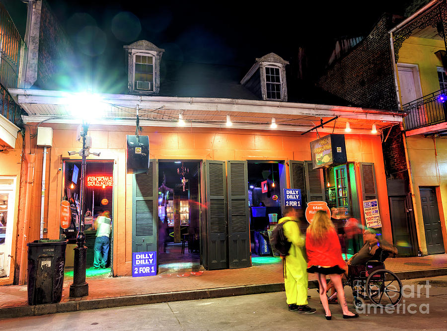 Holding Court on Bourbon Street at Night in New Orleans Photograph by John Rizzuto