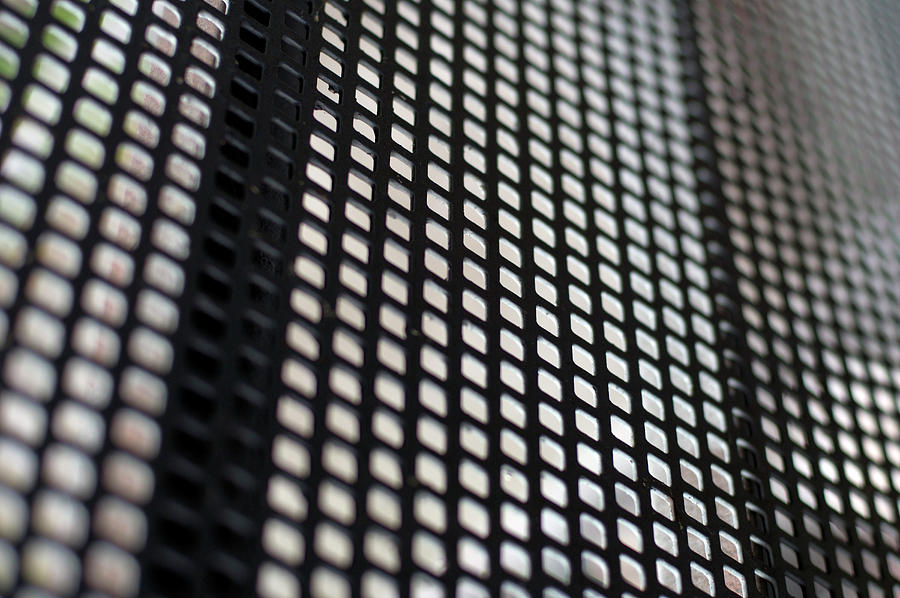 Hole Pattern In A Metal Bar, Detail Photograph by Peter Von Felbert ...