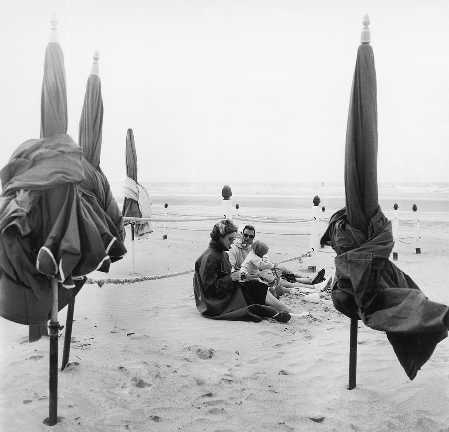 Holidaymakers At Deauville Beach In 1957 Photograph by Keystone-france