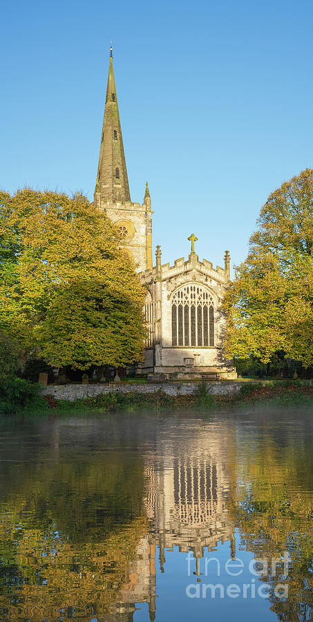 Holy Trinity Church in the Autumn Sunrise Photograph by Tim Gainey
