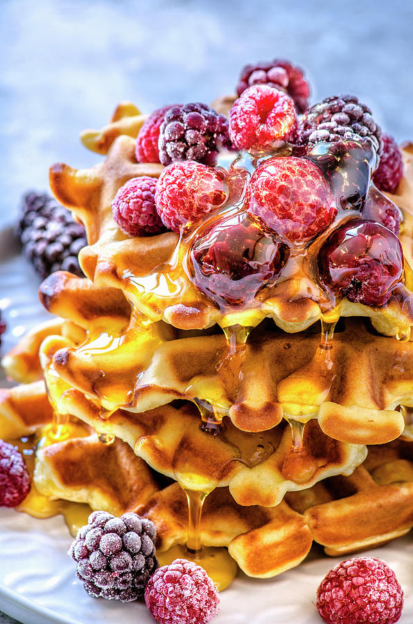Home-made Belgian Waffles Baked In An Electric Waffle-iron With Berries And Maple Syrup Photograph by Gorobina