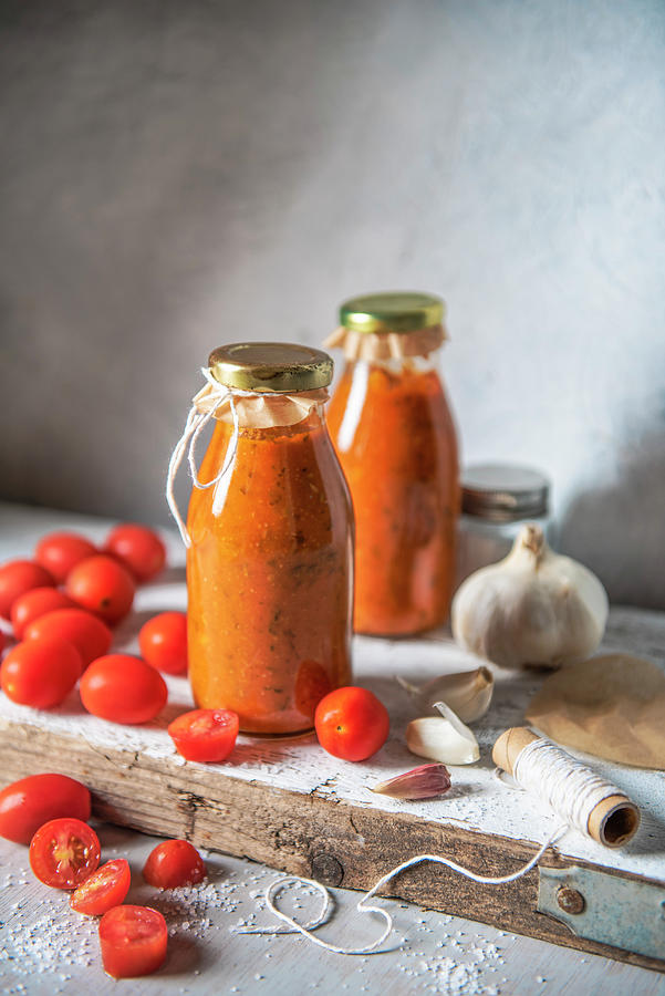 Home Made Cherry Tomato Passata With Garlic, Herbs And Sea Salt Photograph by Magdalena Hendey
