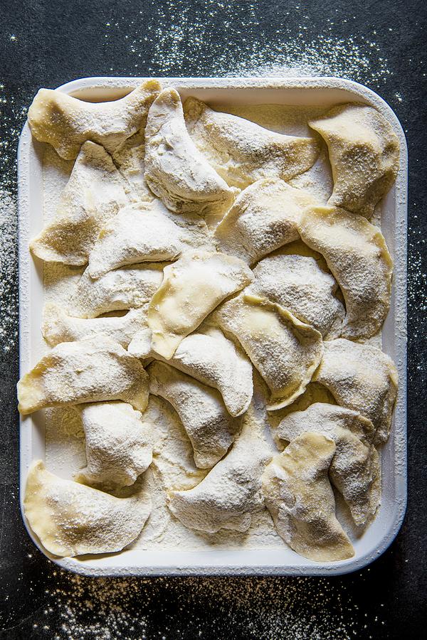 Home Made Ravioli On A Tray Ready To Be Cooked Photograph by Magdalena Hendey